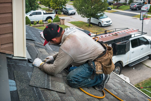 Professional Roofing technician working in Paxico, KS